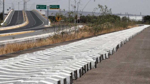 Suman colector pluvial a distribuidor vial Celanese