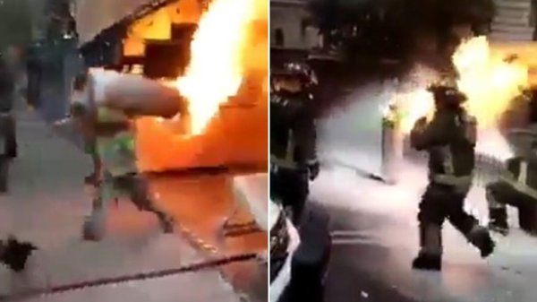 Bombero carga tanque de gas en llamas para evitar explosión en CDMX (video)